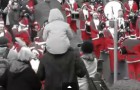 Hundreds of Piping Santas Advance on Edinburgh