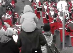 Hundreds of Piping Santas Advance on Edinburgh